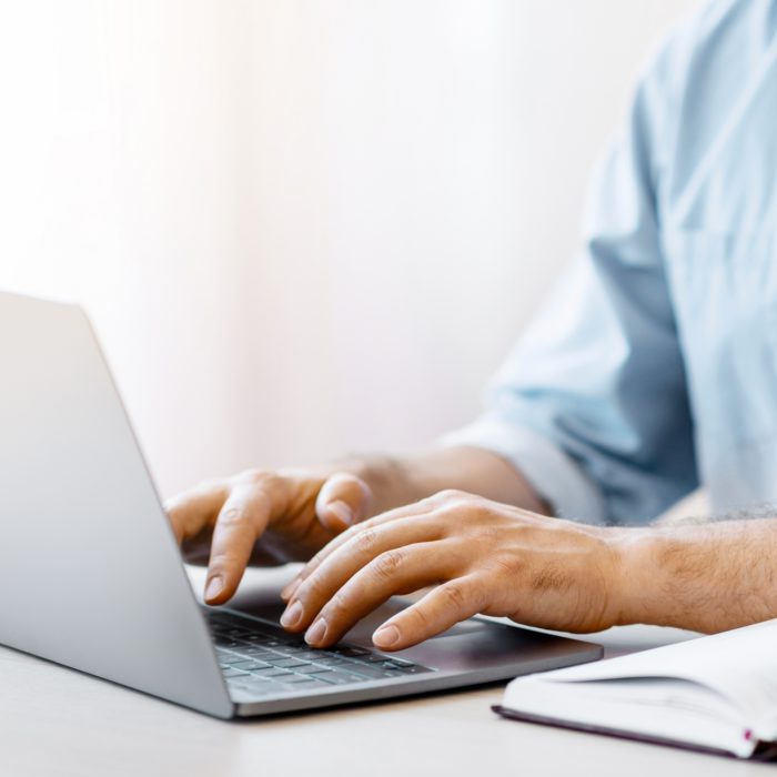 Bearded,Man,Freelancer,Working,On,Laptop,At,Home,Office,,Typing